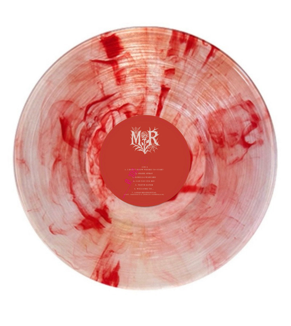 Vinyl record with red and white marbled design and a label in the center on a white background