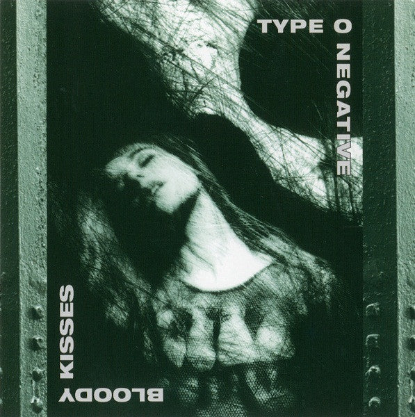Album cover for Type O Negative's 'Bloody Kisses' with a black and white illustration of a woman.